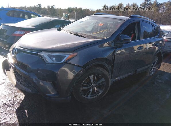 JTMRFREV2GJ064446 2016 TOYOTA LE Gray Vista tres cuartos delantera izquierda
