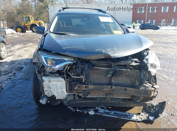 JTMRFREV7JD224780 2018 TOYOTA LE Gray Vista interior trasera