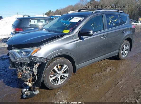 JTMRFREV7JD224780 2018 TOYOTA LE Gray Vista tres cuartos delantera izquierda