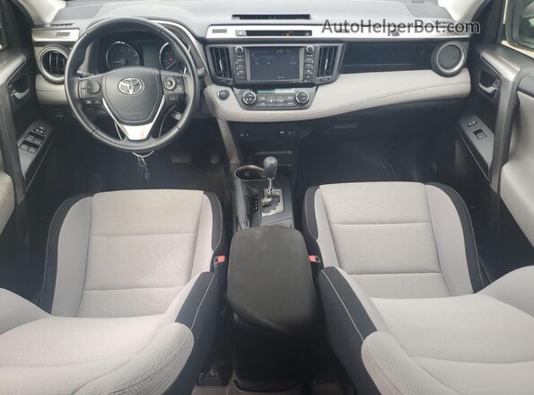 JTMWFREV9GD087384 2016 TOYOTA LE Charcoal Vista del salpicadero