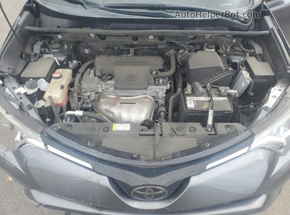 JTMWFREV9GD087384 2016 TOYOTA LE Charcoal Vista del compartimento del motor