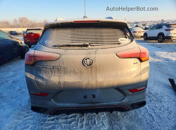 KL4MMDS29PB106919 2023 BUICK ENCORE Gray Rear view