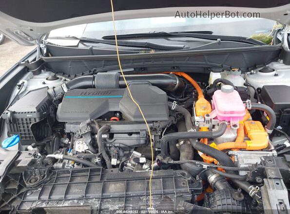 KM8JECA17PU086551 2023 HYUNDAI TUCSON HYBRID Gray Rear view