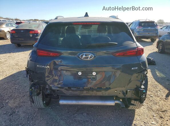 KM8K6CAB2PU030575 2023 HYUNDAI KONA Gray Rear view