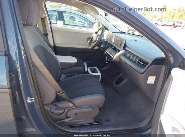 KM8KM4AB5PU146591 2023 HYUNDAI IONIQ 5 Серый Вид салона спереди