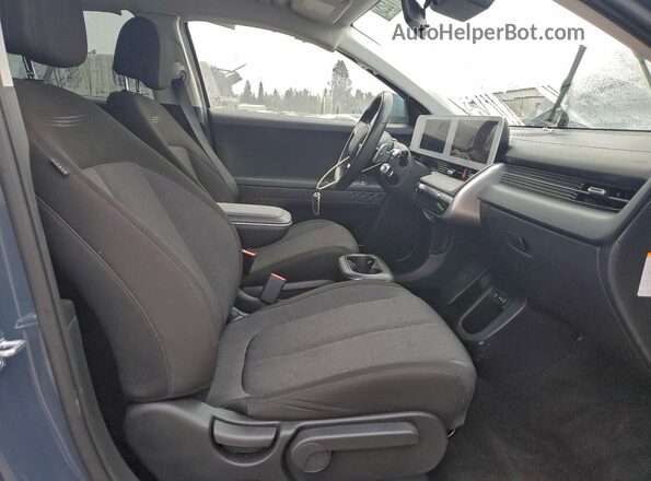 KM8KMDAF5PU214360 2023 HYUNDAI IONIQ Зеленый Вид салона спереди