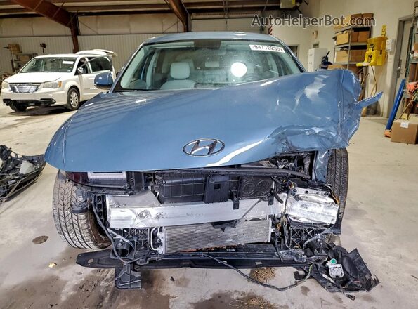 KM8KNDAF9PU192599 2023 HYUNDAI IONIQ Blue Widok z przodu