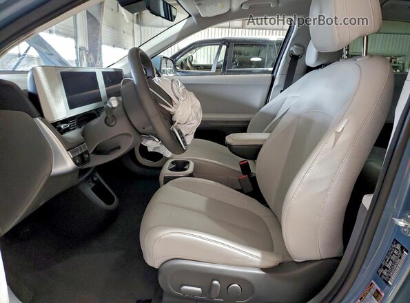 KM8KNDAF9PU192599 2023 HYUNDAI IONIQ Blue Widok wnętrza z przodu