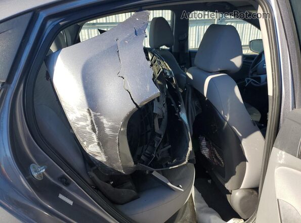 KMHCT4AE3HU310441 2017 HYUNDAI ACCENT Gray Rear seats view