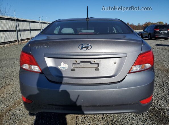 KMHCT4AE3HU310441 2017 HYUNDAI ACCENT Gray Rear view