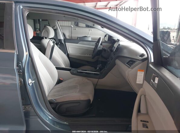 KMHE24L11GA011892 2016 HYUNDAI SONATA HYBRID Light Blue Вид салона спереди