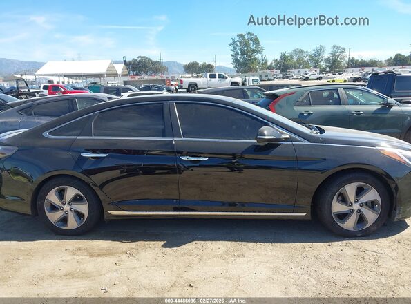KMHE54L23HA061016 2017 HYUNDAI SONATA PLUG-IN HYBRID Black Vista interior trasera