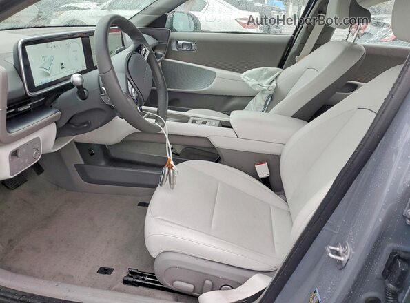 KMHM34AAXSA087907 2025 HYUNDAI IONIQ Gray Vista interior delantera