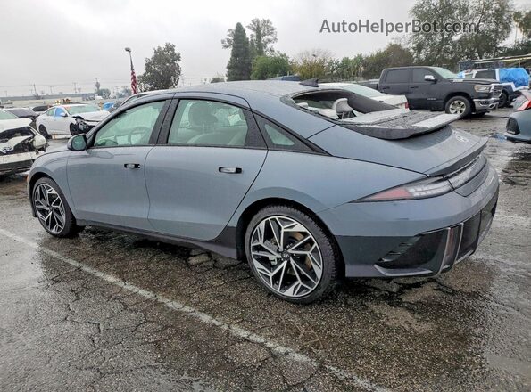 KMHM34AAXSA087907 2025 HYUNDAI IONIQ Gray Trasero izquierdo