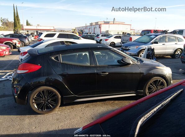 KMHTC6AE9GU266021 2016 HYUNDAI VELOSTER Black Vista interior trasera