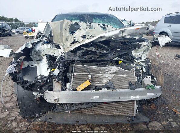 KMTG34SC8RU141376 2024 GENESIS G70 White Вид задньої частини салону