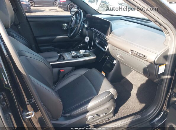 KMUKCDTC3PU005996 2023 GENESIS GV60 Black Vista interior delantera