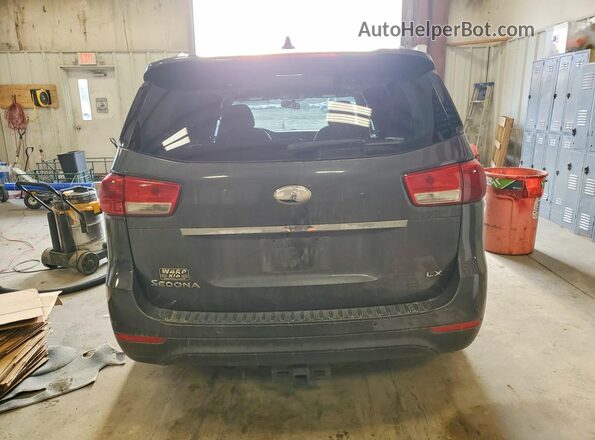 KNDMB5C10H6329089 2017 KIA SEDONA Black Հետևի տեսք