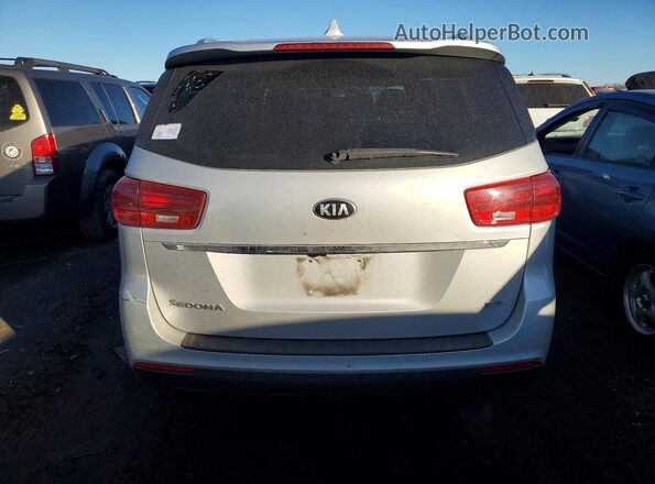 KNDMB5C17K6510522 2019 KIA SEDONA Silver Vista trasera
