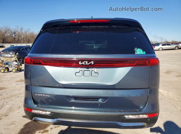 KNDNE5H33P6279342 2023 KIA CARNIVAL Blue Հետևի տեսք