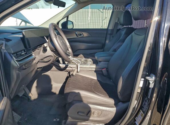 KNDNE5K33S6463990 2025 KIA CARNIVAL Black Widok wnętrza z przodu