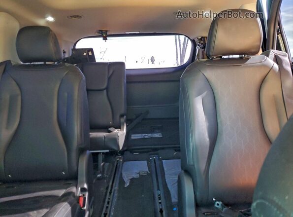 KNDNE5K33S6463990 2025 KIA CARNIVAL Black Widok tylnych siedzeń