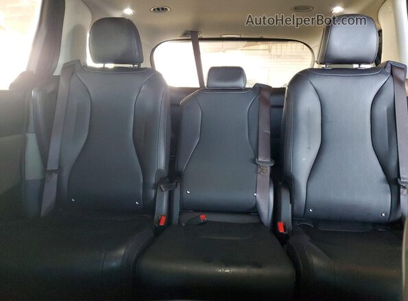 KNDNE5K38S6487248 2025 KIA CARNIVAL White Vista de los asientos traseros