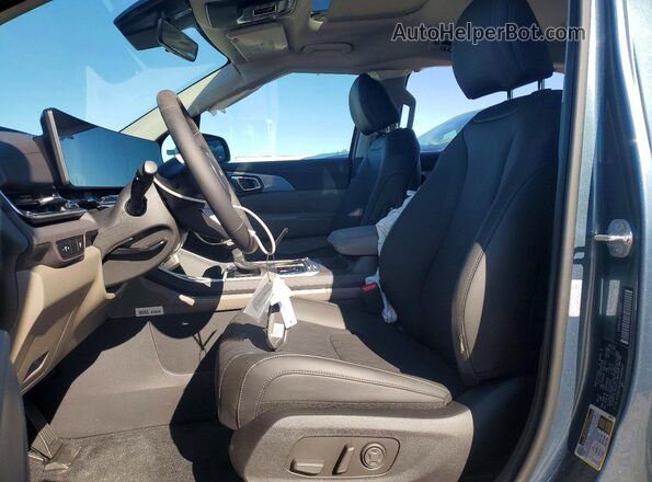 KNDNE5K38T6589957 2026 KIA CARNIVAL Blue Widok wnętrza z przodu