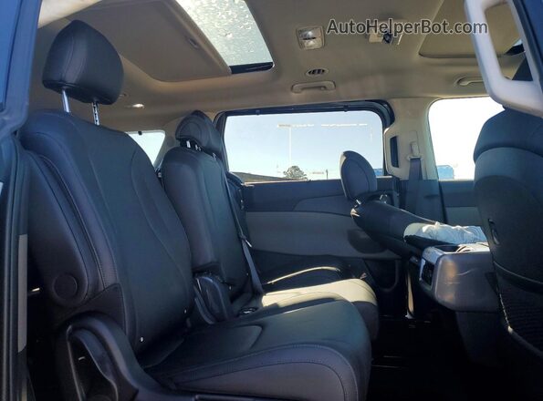 KNDNE5K38T6589957 2026 KIA CARNIVAL Blue Widok wnętrza z tyłu