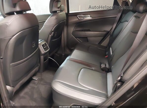 KNDPVCAG9P7067856 2023 KIA SPORTAGE HYBRID Black VIN კოდის სტიკერის ხედი