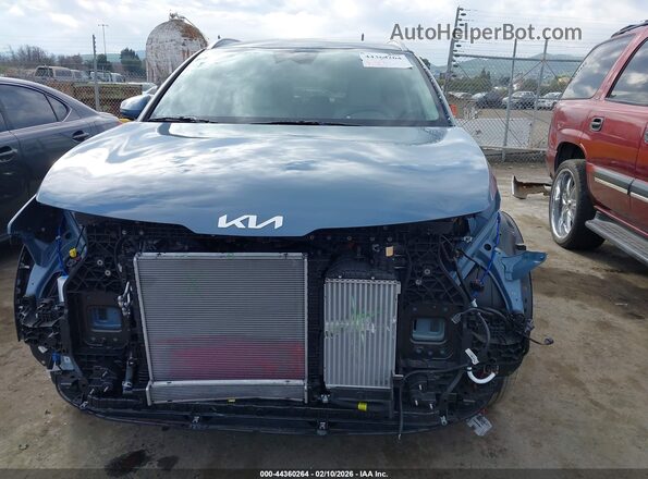 KNDPVDDG1T7309826 2026 KIA SPORTAGE HYBRID Blue Rear interior view
