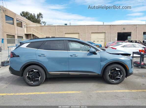 KNDPVDDG6T7285295 2026 KIA SPORTAGE HYBRID Light Blue Вид задньої частини салону