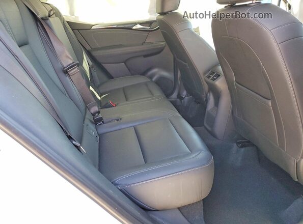 LRBFZME49RD064142 2024 BUICK ENVISION White Вид задньої частини салону