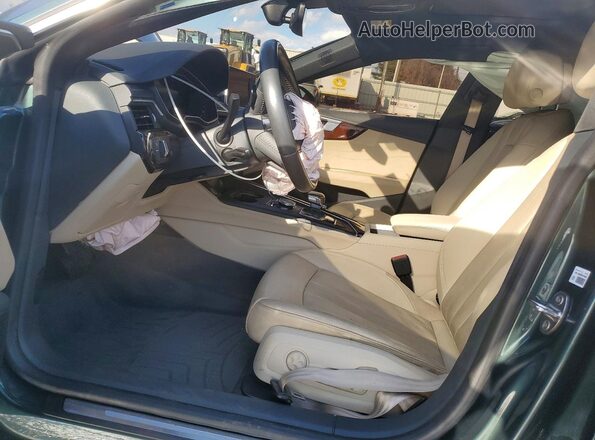 WAUBNCF58JA065282 2018 AUDI OTHER Green Vista interior delantera