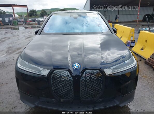 WB523CF02SCT31149 2025 BMW IX Black Vista interior trasera