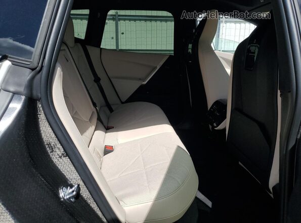 WB523CF05RCR09402 2024 BMW IX Белый Вид задней части салона