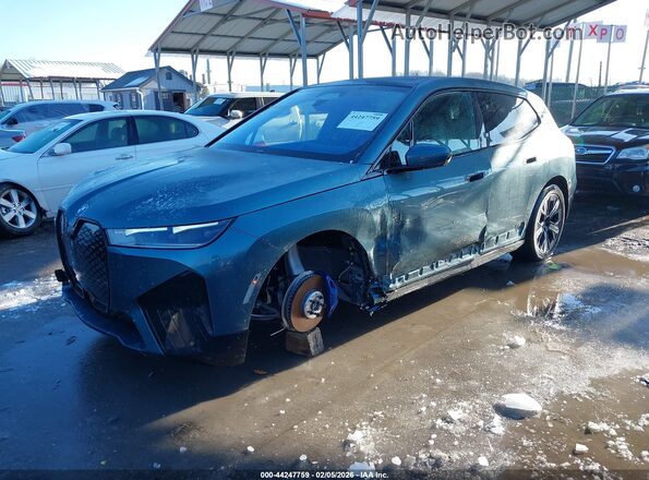 WB523CF06RCP02999 2024 BMW IX Blue Vista tres cuartos delantera izquierda
