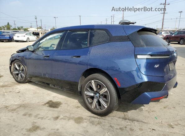 WB523CF06RCP23335 2024 BMW IX Синий Задняя левая четверть