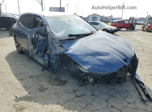 WB523CF06RCP23335 2024 BMW IX Синий Передняя правая четверть