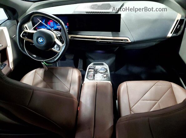 WB523CF06SCT45877 2025 BMW IX Blue Առջևի վահանակի տեսք