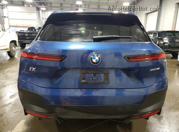 WB523CF06SCT45877 2025 BMW IX Blue Հետևի տեսք