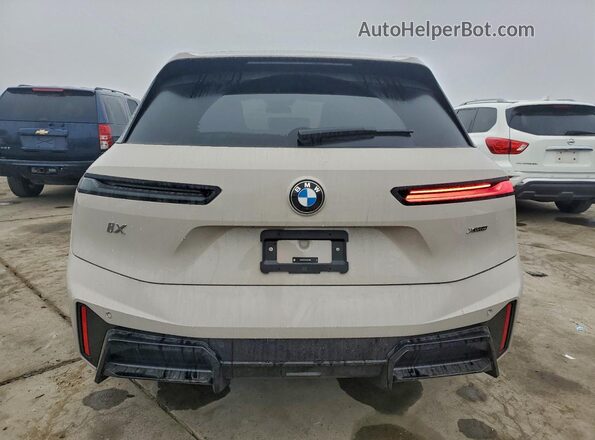 WB543CF02TCW07808 2026 BMW IX Коричневый Вид сзади