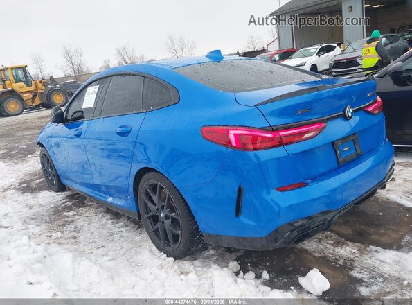 WBA13AL05L7F75011 2020 BMW M2 Blue Trasero izquierdo