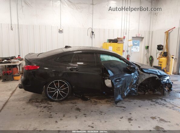 WBA13AL09M7H09102 2021 BMW M2 Black Vista interior trasera