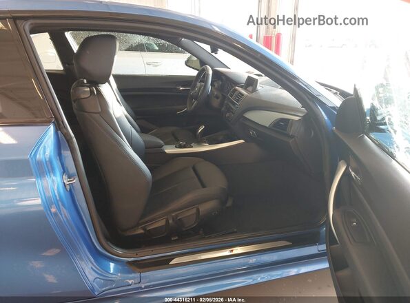 WBA1F9C5XGV545597 2016 BMW 2 SERIES Синий Вид салона спереди