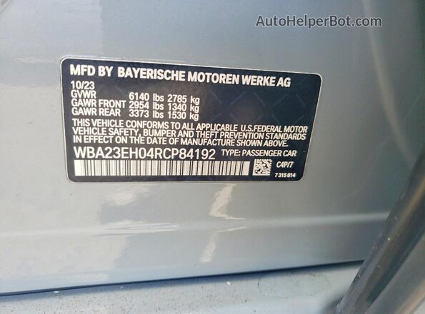 WBA23EH04RCP84192 2024 BMW 7 SERIES Gray Vista del compartimento del motor