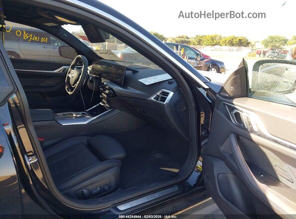 WBA33FB01TFV85268 2026 BMW 4 SERIES Black Front interior view