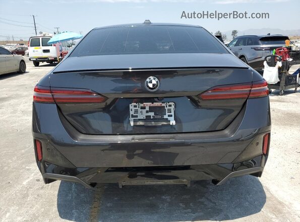 WBA43FJ04RCR80061 2024 BMW 7 SERIES Black Вид ззаду