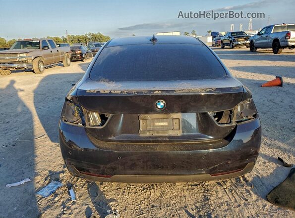 WBA4A9C52GGL89412 2016 BMW 4 SERIES Black Widok z tyłu