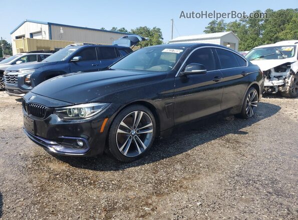 WBA4J1C04LCE64783 2020 BMW 4 SERIES Black 